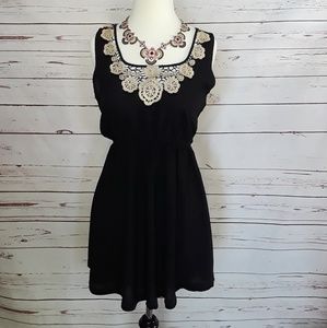 A is for Audrey• Black dress lace neckline. Size M